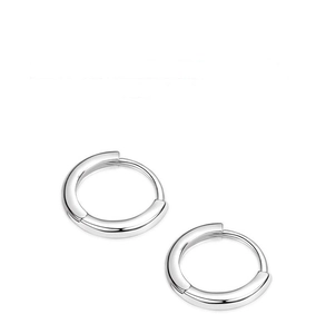 Macro detail of high-quality silver-plated stud earrings with a smooth polished finish