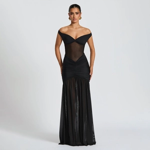 Detail of sheer mesh patchwork and ruched texture on this black off-shoulder maxi dress