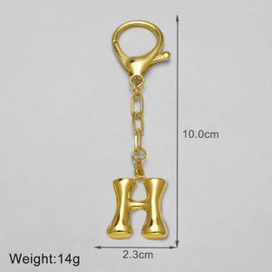 Detailed size specifications for the gold letter H keychain with dimensions and weight