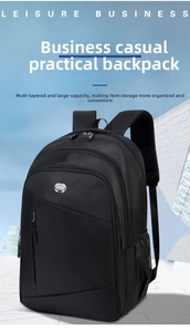 Detailed close-up of breathable padded shoulder straps and mesh pockets on black backpack