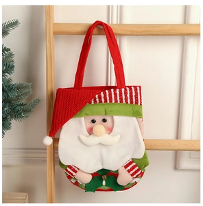 Detailed Christmas felt gift bag with 3D Santa decor hanging on a wooden ladder