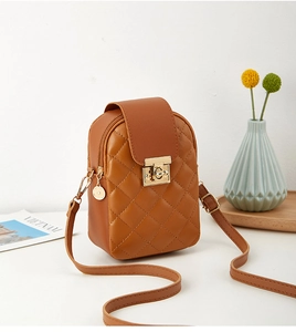 Detail of brown quilted faux leather crossbody phone bag with gold twist lock and hardware