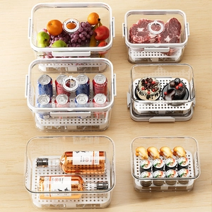 Set of 6 clear plastic food storage boxes with date trackers and drain boards on wood surface