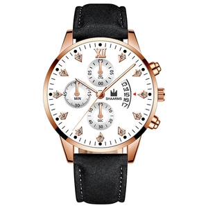 Detailed macro view of rose gold case white dial with sub-dials and date window