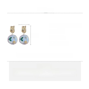 Detailed view of resin flower earrings with crystals, measurements 3.5cm by 2cm