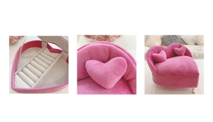 Detailed views of a heart-shaped pink velvet sofa jewelry box with storage slots