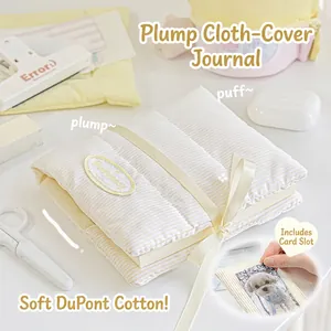 Pluffy yellow striped cloth notebook with ribbon closure and card slot design