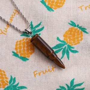 Collier avec pendentif œil de tigre en forme de balle et chaîne torsadée argentée mixte