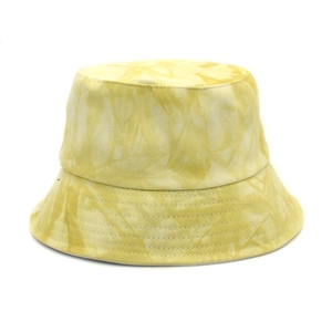 Detailed view of yellow tie-dye bucket hat featuring reinforced stitching on the brim