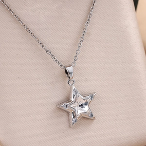 Star pendant necklace with sparkling crystal and silver metal chain for women