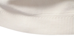 Detail shot of the ribbed knit hem and texture on this men's cream white sweater