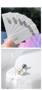 Macro detail of 6mm multifaceted crystal stud earrings with shiny titanium steel screw back