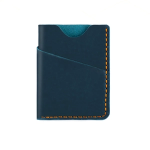 Detail of dark blue crazy horse leather card holder with contrast orange stitching