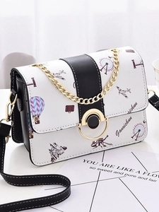 Chic white crossbody bag with travel illustrations and golden chain decoration