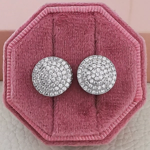 Luxury round pavé zircon stud earrings presented in a premium pink velvet jewelry box