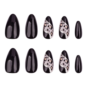 Almond-shaped black press-on nails with leopard print and silver glitter lines