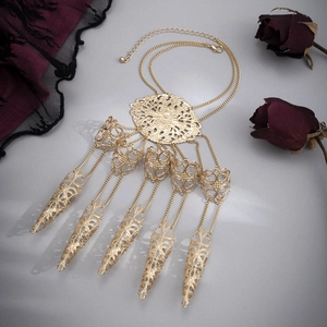 Intricate gold gothic slave bracelet with hollow floral disc and five mesh finger rings