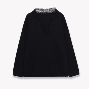 Women's black V-neck wool blend knit sweater with elegant lace trim detailing