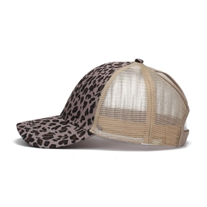 Detail view of leopard print baseball cap with breathable mesh back and canvas visor