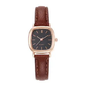 Square women's quartz watch with rose gold case, black dial, and brown leather strap