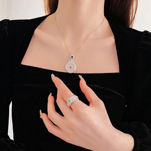 Modern Chinese style silver necklace with round white jade pendant and zircon accents