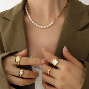 French style titanium necklace with freshwater pearls and assorted gold rings set