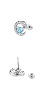 Macro view of silver crescent moon stud earring with blue heart zircon and screw back