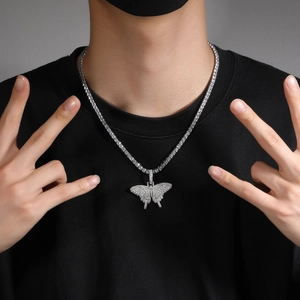 Hip hop silver butterfly pendant necklace with tennis chain and pavé crystals on model