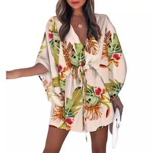 Women's summer V-neck dress with tropical leaf print and drawstring waist in cream
