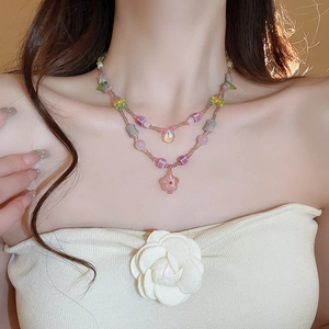 Double-layered colorful glass flower beaded necklace with a pink water drop pendant