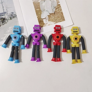 Set of four colorful telescopic suction cup robot toys in blue, purple, red and yellow