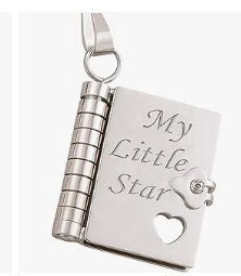 Detailed close-up of book-shaped titanium pendant with My Little Star engraving