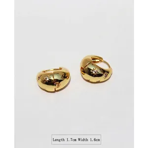 Golden dome hoop earrings with sparkling star-set cubic zirconia stones for women