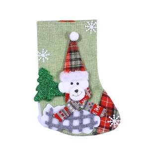 Linen Christmas stocking with 3D polar bear and sequined tree decoration in green