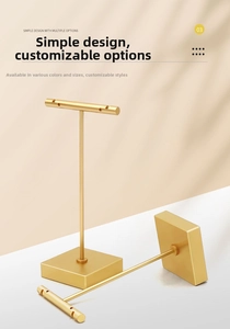 Close-up of matte gold T-bar earring display stand with stable base and hanging holes