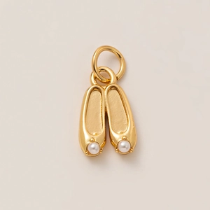 18K gold-plated ballet shoes pendant featuring white pearls and high-shine metallic finish