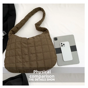 Close-up of coffee brown quilted tote bag with iPad and iPhone showing large capacity