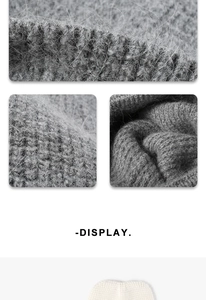 Gros plan du bonnet gris en tricot montrant la texture duveteuse et les détails des fibres