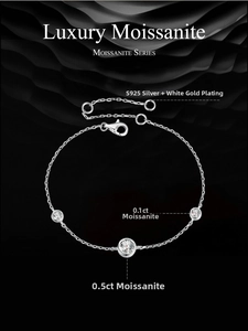 Detail shot of three round moissanite stones set in a S925 sterling silver plated bracelet