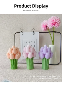Detail of tulip shaped scented candles in orange pink and purple colors for gift