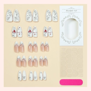 Kit de faux ongles vintage dorés avec motifs 3D et emballage cadeau blanc élégant