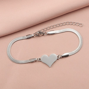 Detailed view of silver heart pendant on a flat snake chain with lobster clasp and extension