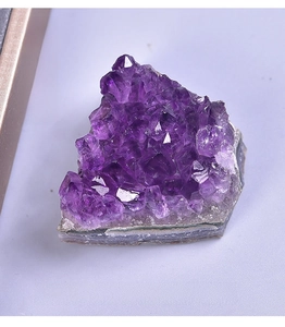 Close-up of a natural Uruguay deep purple amethyst cluster crystal mineral specimen