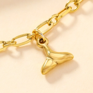 Collana con ciondolo a coda di balena in acciaio inossidabile dorato e finitura lucida