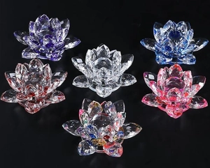 Close-up of multi-colored crystal lotus ornaments in six vibrant hues with elegant glass texture