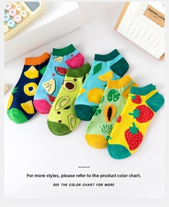 Detailed flat lay of six pairs of summer fruit-themed ankle socks with colorful patterns
