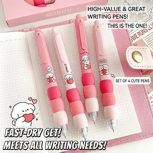 Detail of cute pink retractable gel pens featuring soft spherical sponge grips and cartoon dog motifs