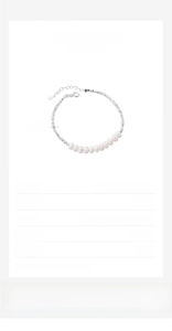 Detail of s925 silver irregular beads and 4-5mm freshwater pearls on a delicate chain