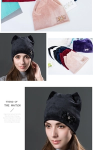 Detail of velvet cat ear beanie showing rhinestone bow accent and color variants