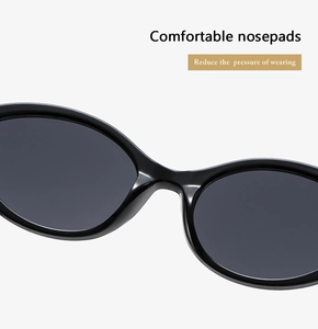Detail of comfortable integrated nose pads on black cat-eye sunglasses for pressure reduction